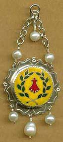 heraldic laurel in a renaissance setting with pendant pearls