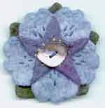 felt flower brooch with abalone button center